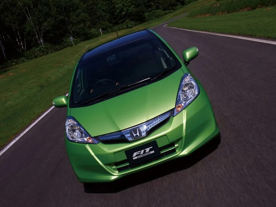 Honda am. Хонда фит гибрид РС. Хонда фит РС гибрид 2012. Honda Fit gp1 Hybrid. Хонда фит гибрид 2011.