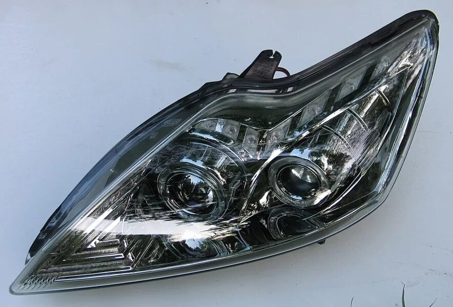 оригинальная фара форд фокус 2 дорестайлинг. Ford focus 2 оптика. фара правая форд фокус 2 дорестайлинг. оригинальные фары форд фокус 2. линзы на форд фокус 2 рестайлинг.