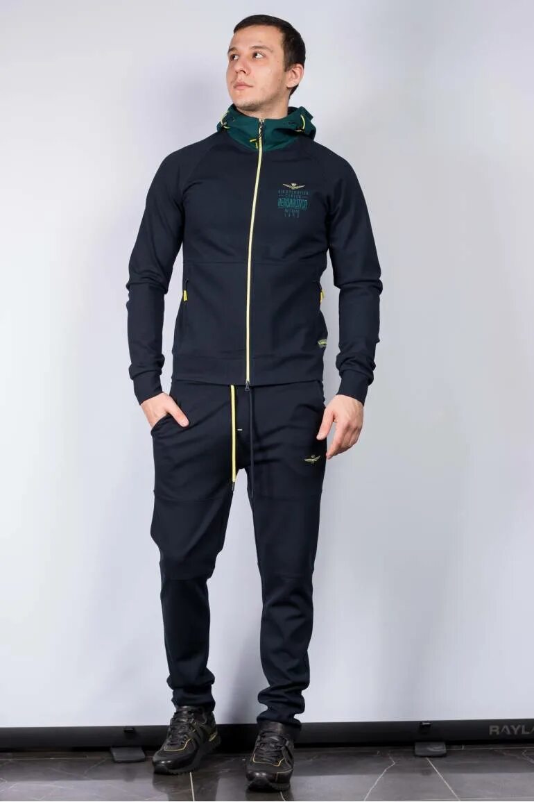 Aeronautica militare костюмы белый мужской. Aeronautica militare комбинезон мужской. Спортивный костюм aeronautica militare. Спортивный костюм материал полиэстер. Спортивный костюм aeronautica militare мужской.