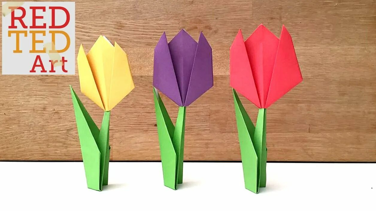 Цветок оригами легкий тюльпан. Оригами из бумаги для детей цветы тюльпан. Тюльпан из цветной бумаги для детей оригами. Оригами из бумаги для детей крокус
