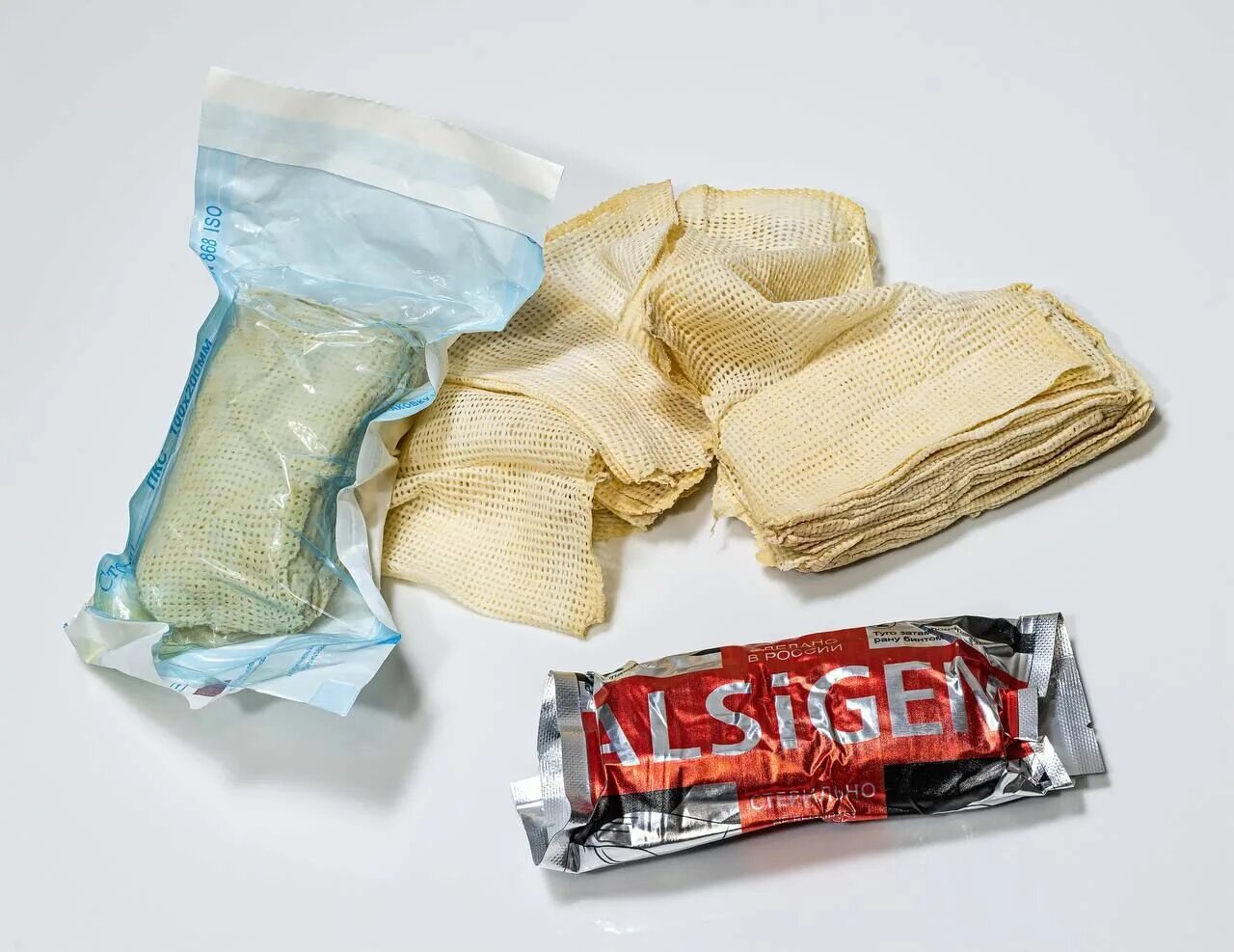 Средство гемостатическое гепоглос. Alsigem повязка. Бинт с пропиткой celox 3 метра. Z образный бинт гемостатический. Бинт гемостатический кровоостанавливающий.