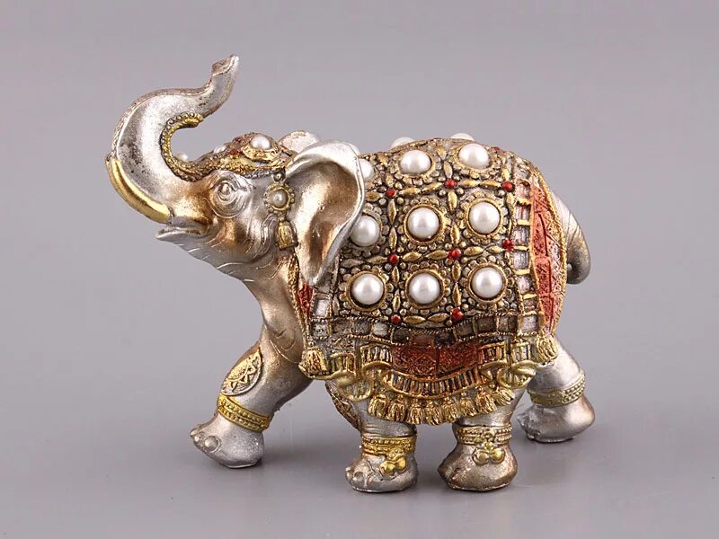 слон с опущенным хоботом по фен шуй. фэн шуй про слоников. фигурка слона с поднятым хоботом. талисман фэн шуй слон. слон фэн шуй.
