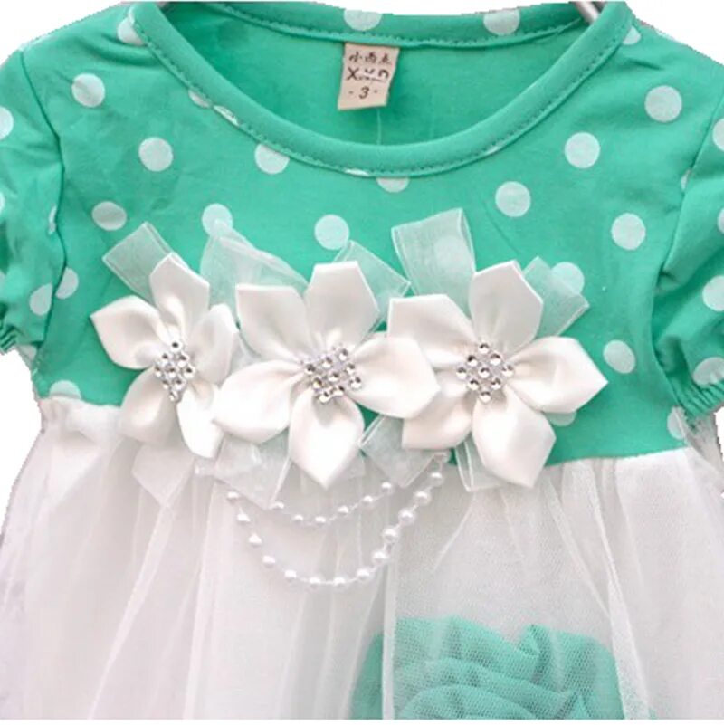 детское платье с бусинами. украшение детскому платью. украшение детскому платью. украшение детскому платью. платье в цветочек для девочки.