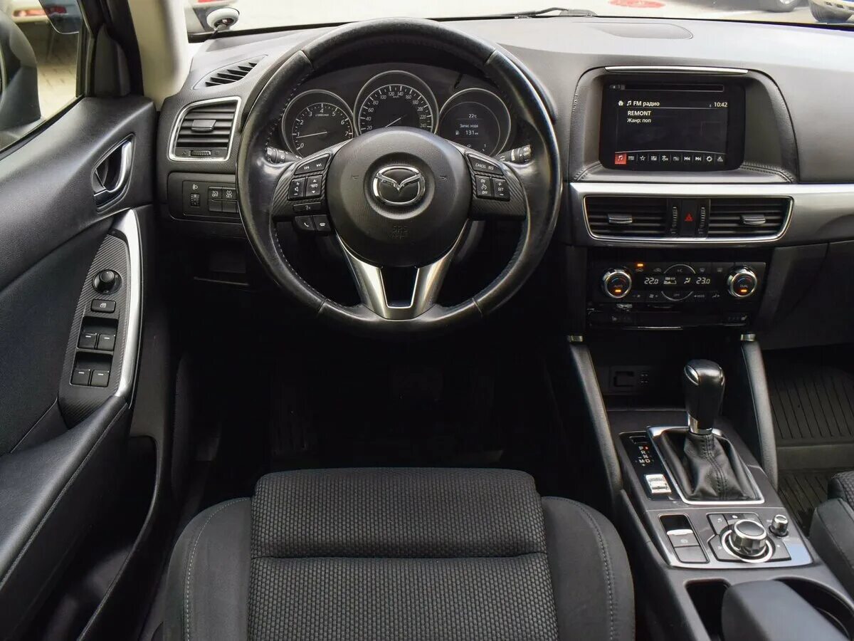 Отличия мазда сх5. Mazda CX-5 2015. Mazda CX 5 салон. Mazda CX 5 2015 салон. Mazda CX-5 2.5 2015.