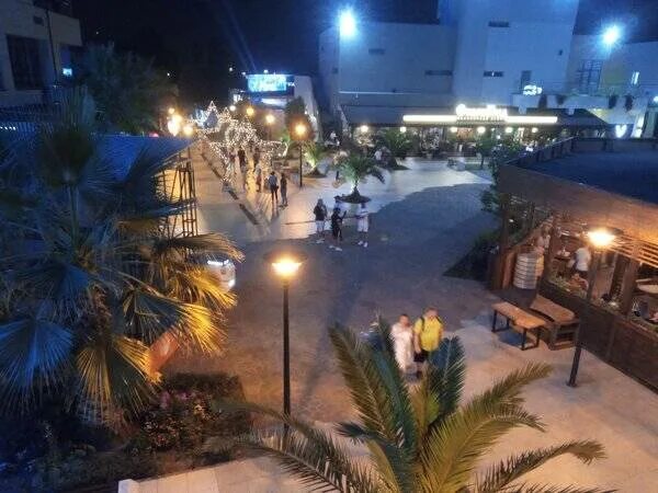 Вечерний адлер куда сходить. Новый год адлер олимпийский парк 2021. Вечером в адлере куда. Сочи парк адлер 2022. Олимпийский парк сочи ночью фонтаны.