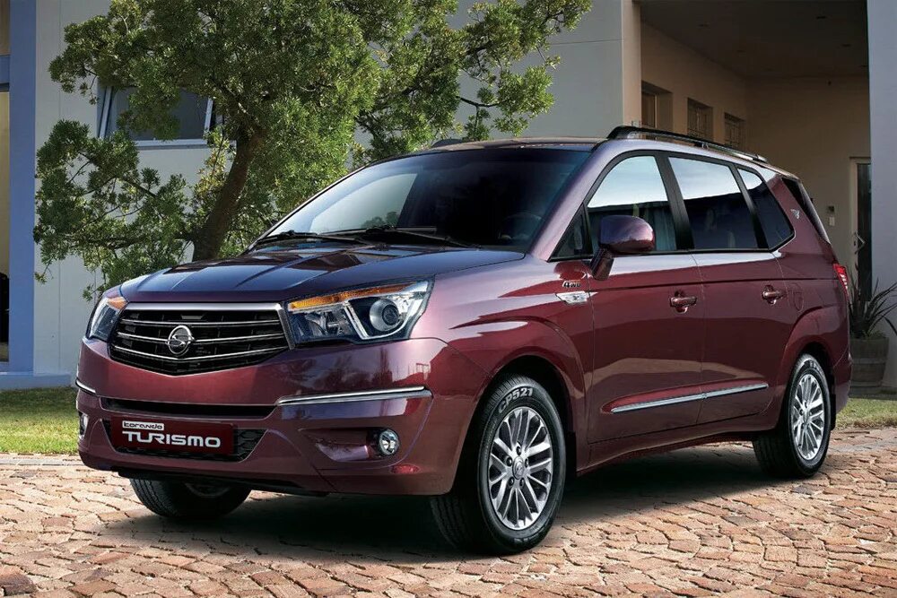 Какой санг енг лучше. SSANGYONG Stavic. SSANGYONG Rodius. SSANGYONG Korando Turismo 2013. Саньенг Корандо Туризмо.