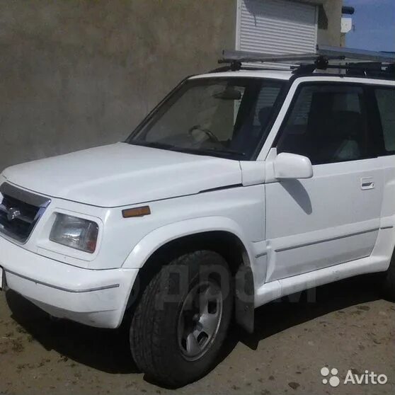 Сузуки эскудо 1997. Сузуки эскудо 1997 года. Suzuki Escudo 1997 фиксатор планки капота. Сузуки эскудо 1997 фото.