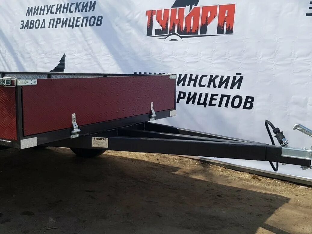 Тойота тундра автовоз. Минусинские прицепы. Минусинский завод прицепов тундра. Прицеп маленький на ниву. Ниссан навара с прицепом.