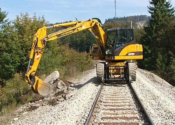 Экскаватор одноковшовый caterpillar 311d lrr. Гидромолот мг-300 к эо-3323а. Ковш экскаватора. Экскаватор. Катерпиллер 400 экскаватор.