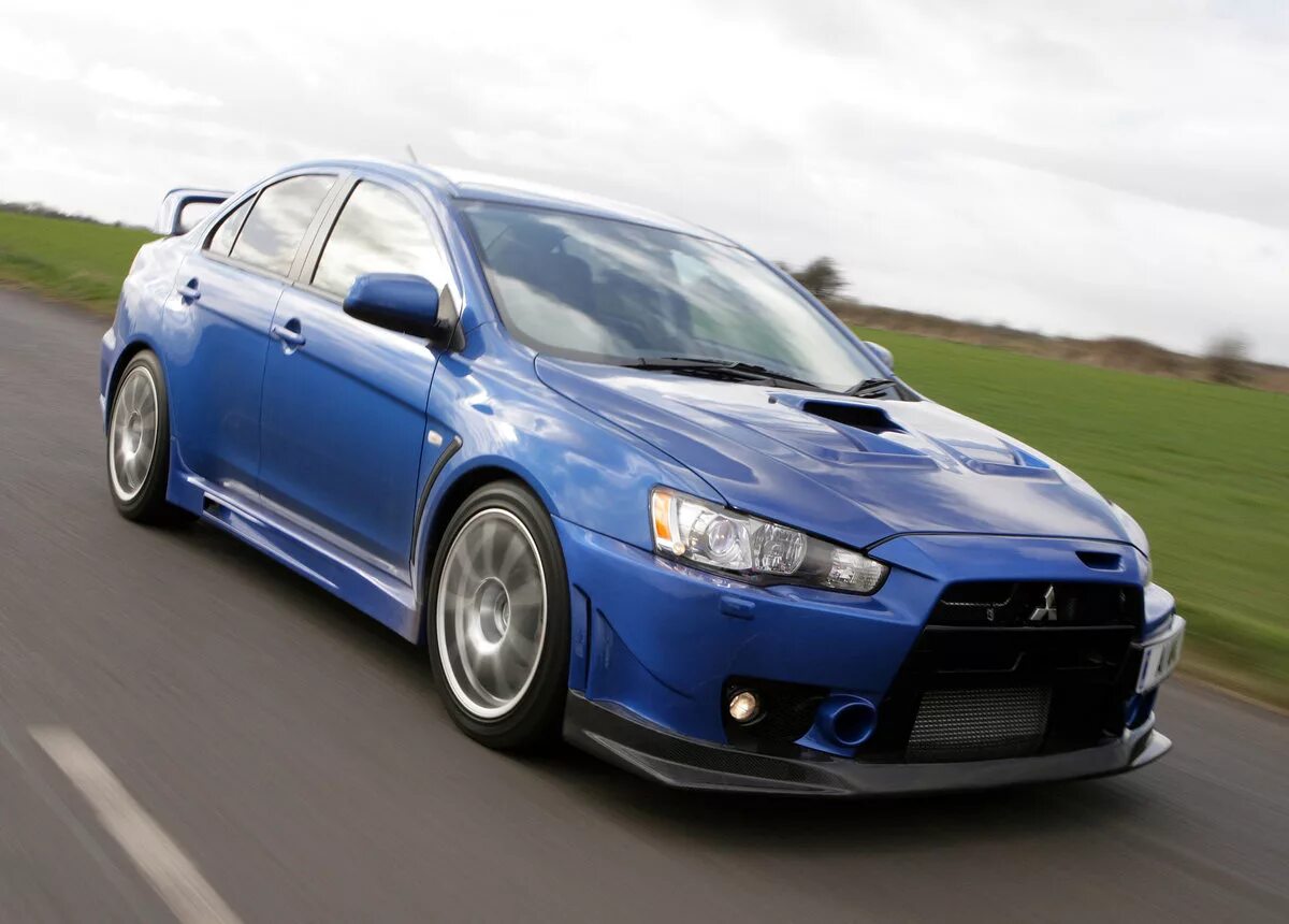 Mitsubishi Lancer Evolution 10. Mitsubishi Lancer Evolution x FQ-400. Митсубиси ланцер 10 EVO. Mitsubishi Lancer Evolution x 10.