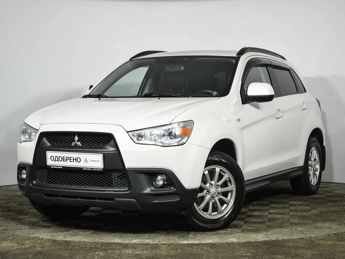 Мицубиси асх бу купить. Мицубиси АСХ 2012 белый. Mitsubishi ASX белый 2012. Митсубиси АСХ 2012 В белом. Mitsubishi ASX 1.6 МТ 2012.