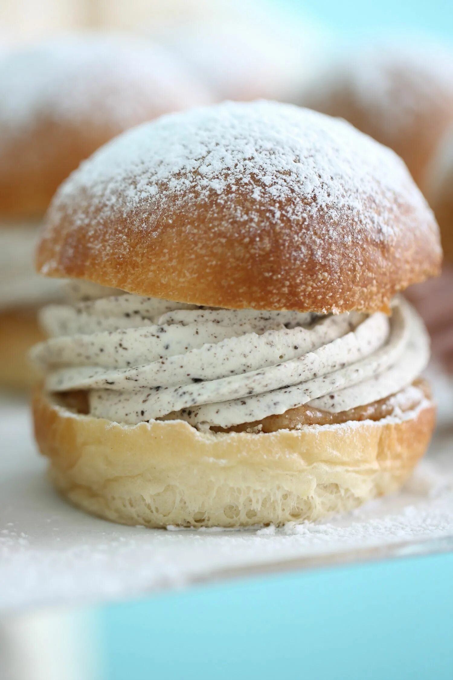 Sweet buns. Semlor buns. Sweet bun. Bun with Cream. Sweet French bun.