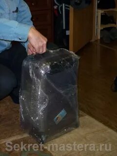 Чемодан замотан пленкой