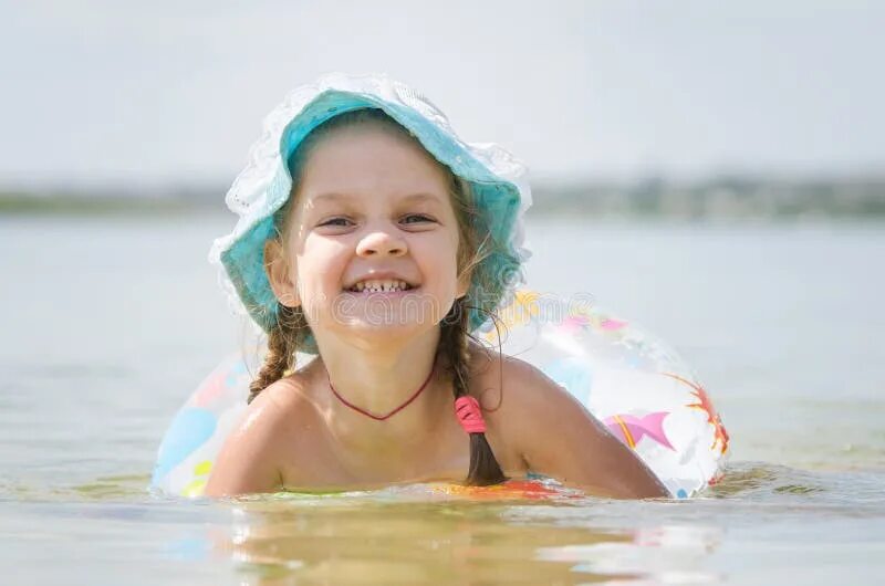 Blond Girl Swimming in Lake River Stock Photo - Image of eyes, beautiful: 167001