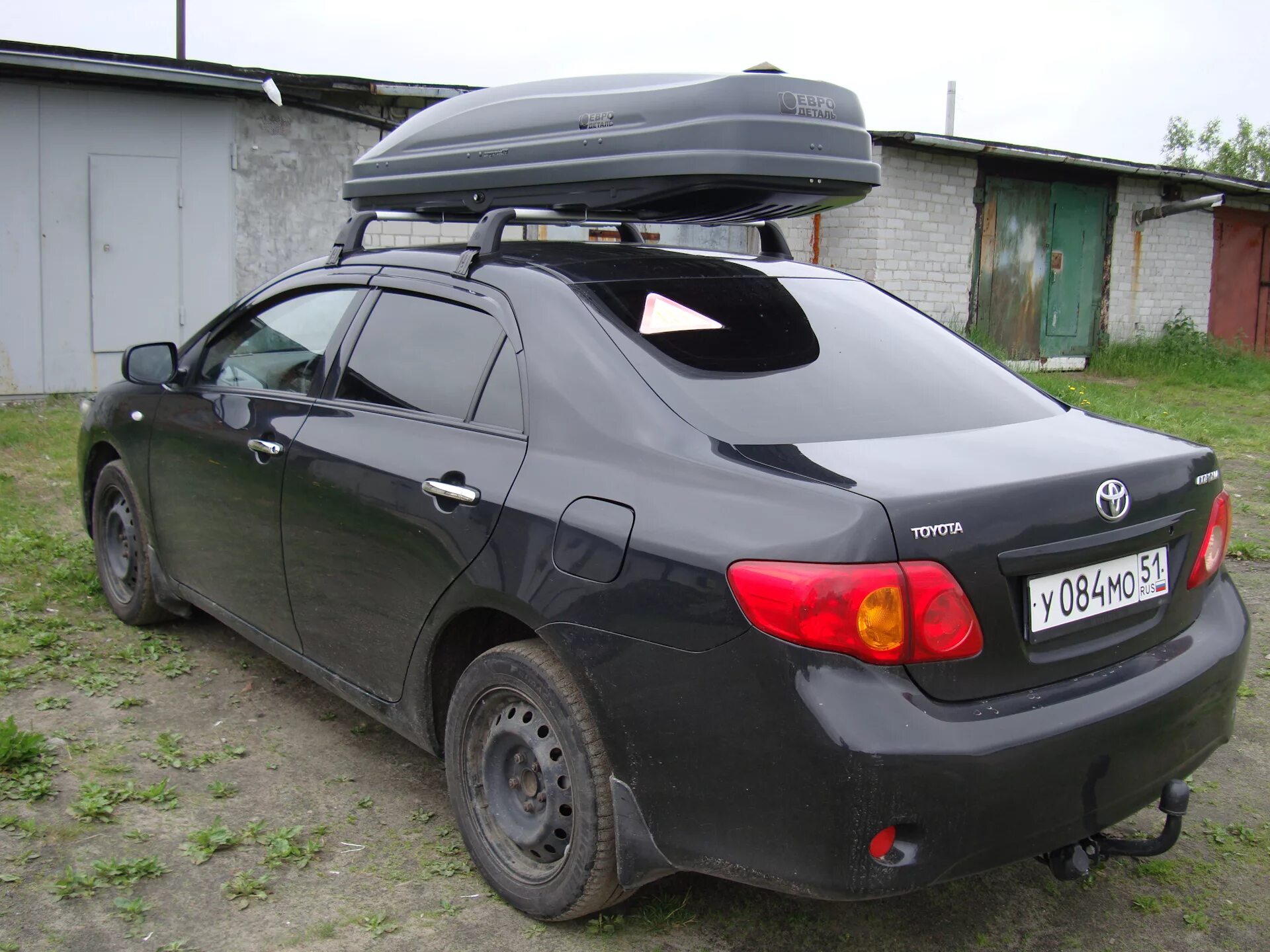 Купить багажник на короллу. Багажник на крышу Toyota Corolla e150. Тойота Королла 2008 багажник. Багажник на крышу Corolla 150 Thule. Corolla 120 багажник.