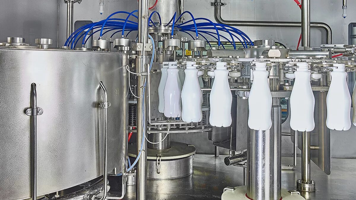 Разлив молока в бутылки. Таурус полуавтомата асептического розлива. Ультрапастеризация молока оборудование. Пастеризация стерилизация ультрапастеризация. Асептический розлив молока.