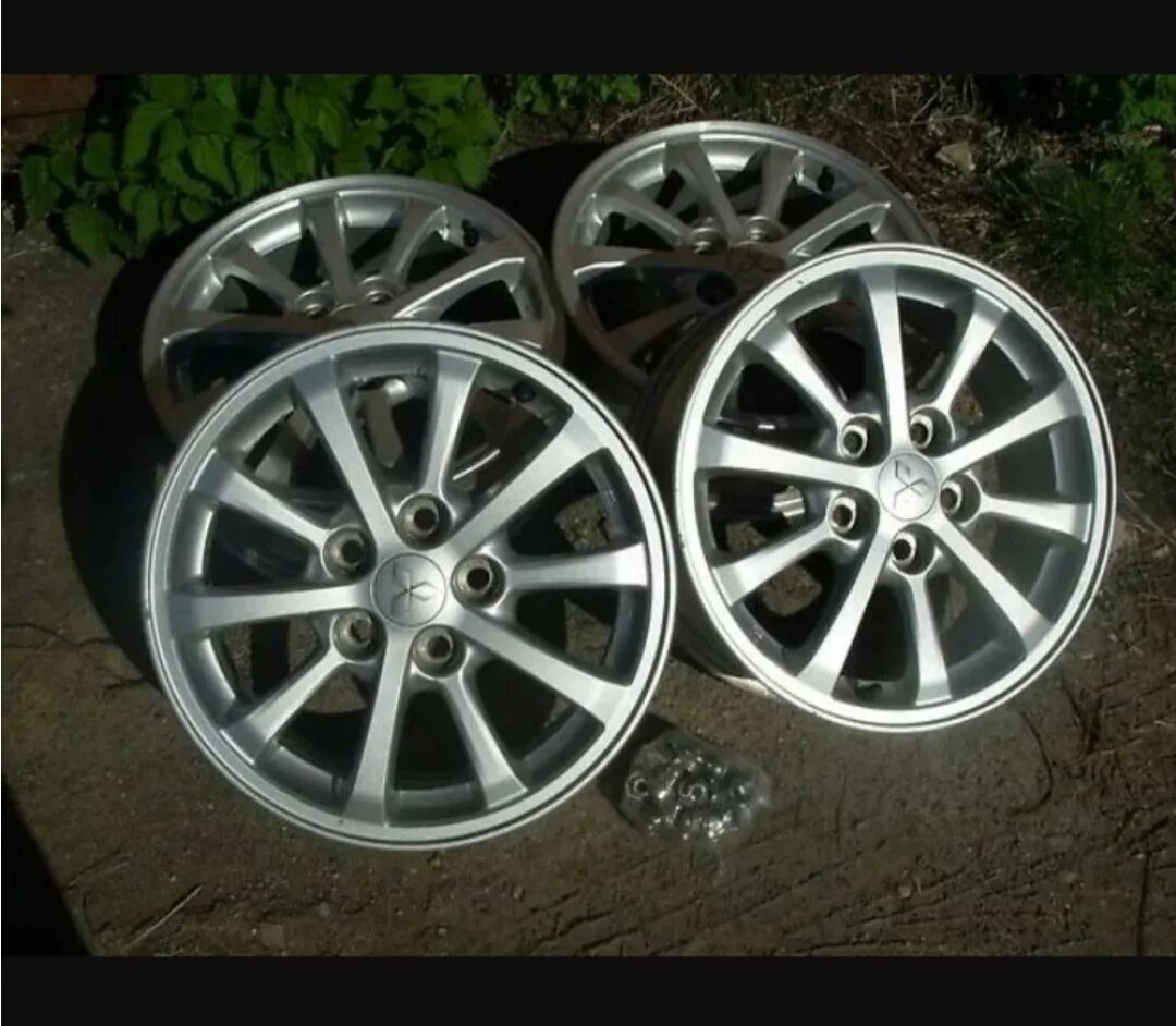 Mitsubishi 10 lancer литые диски. оригинальные диски mitsubishi lancer r16. литые диски митсубиси лансер r16. оригинальные диски лансер 10. диски митсубиси лансер 10 r16.