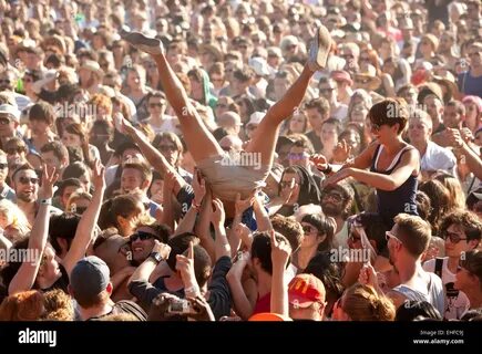 Guy crowd surfing at Lovebox festival in Victoria Park London July 2010 Sto...