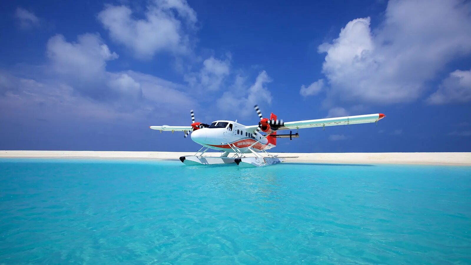 Гидроплан four Seasons Мальдивы. Seaplane Мальдивы. Гидросамолет Maldivian. Самолёт-амфибия л-42. Летим над островами карибского моря