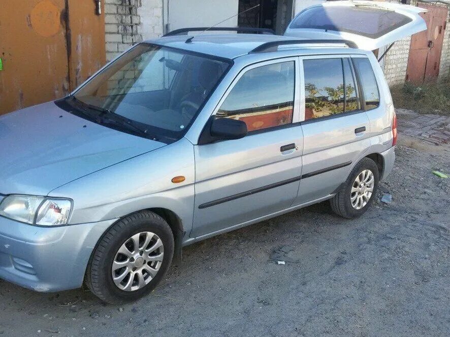 Купить мазду демио 1.3. Мазда Демио 2001. Mazda Demio 1.3 МТ, 2001,. Mazda Demio 2001 год. Mazda Demio/2 2001.