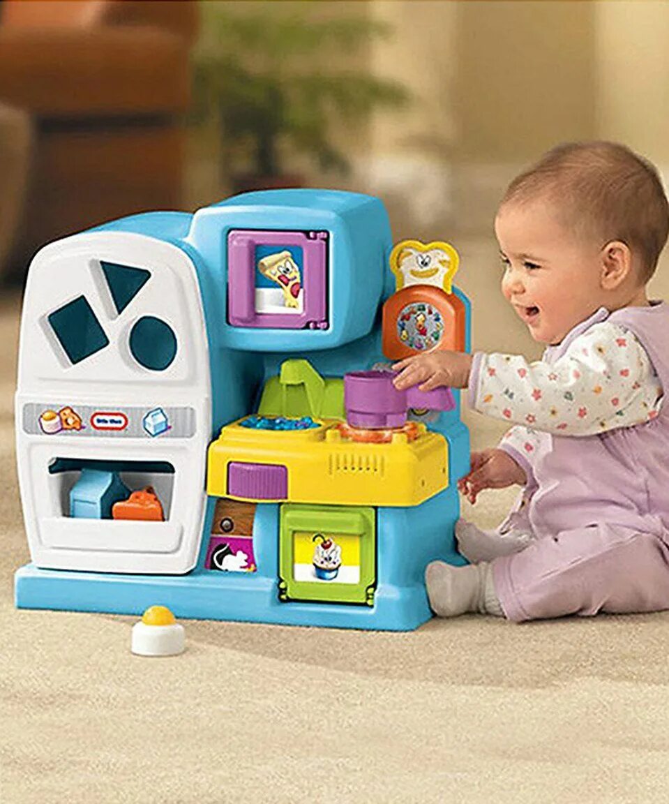 Ребенку 2 года какие игрушки. Little Tikes "развивающая сортер".. Little Tikes игрушки. Сортер little Tikes чемоданчик. Игрушки для детей 1 год.