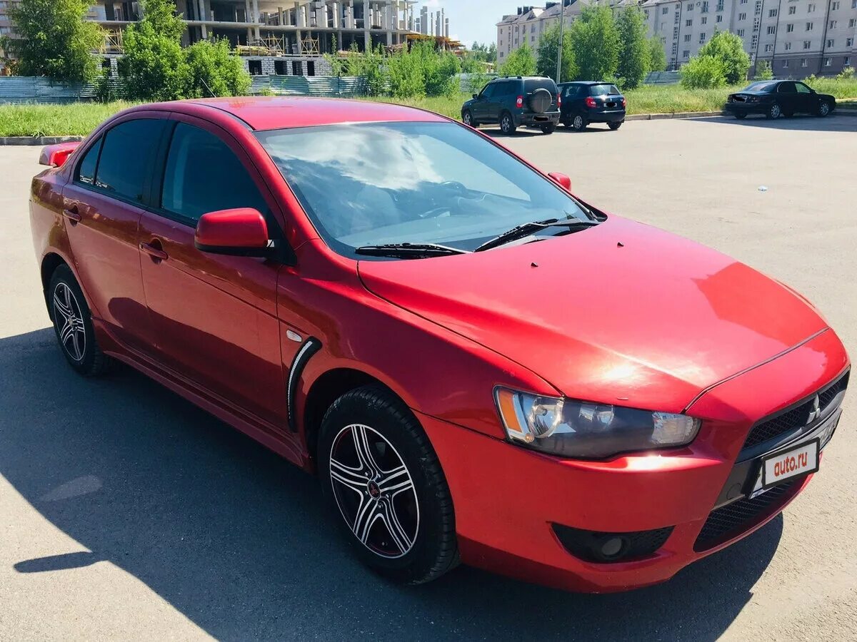 Мицубиси 10 года. Mitsubishi Lancer x 2010. Mitsubishi Lancer Lancer 2010. Митсубиси Лансер красный 2010. Мицубиси Лансер x 2010.