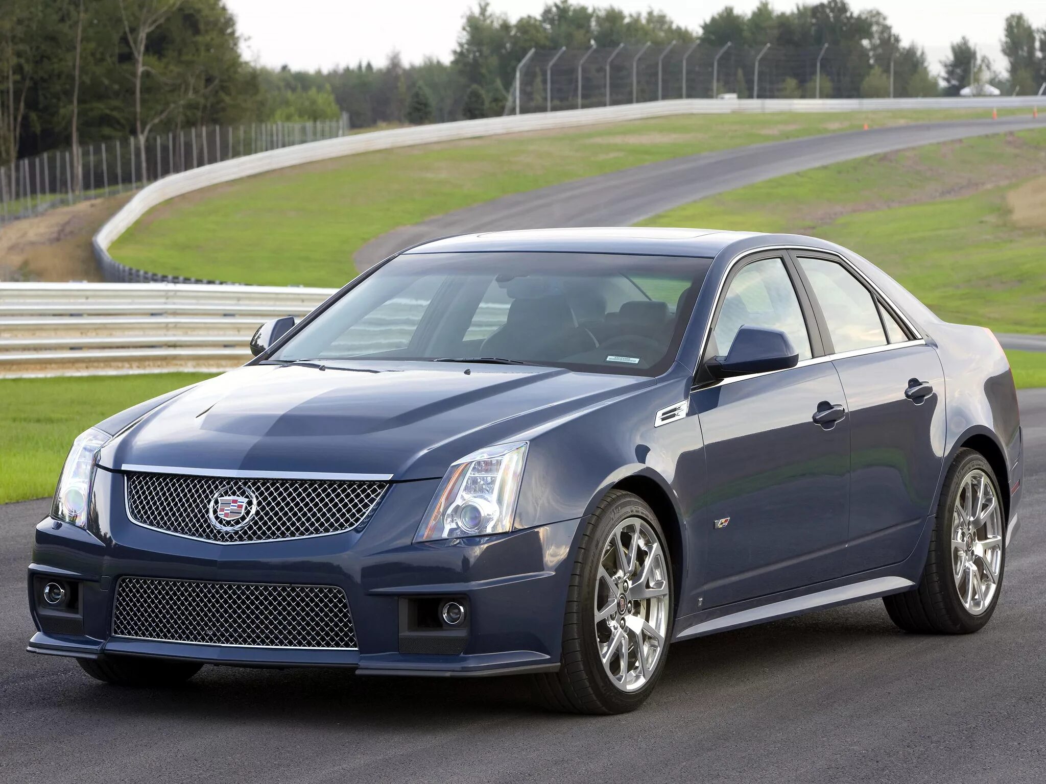 Легковой автомобиль развивая. Cadillac CTS V 2008. Cadillac CTS-V 2009. Кадиллак CTS V. Cadillac CTS 2009.