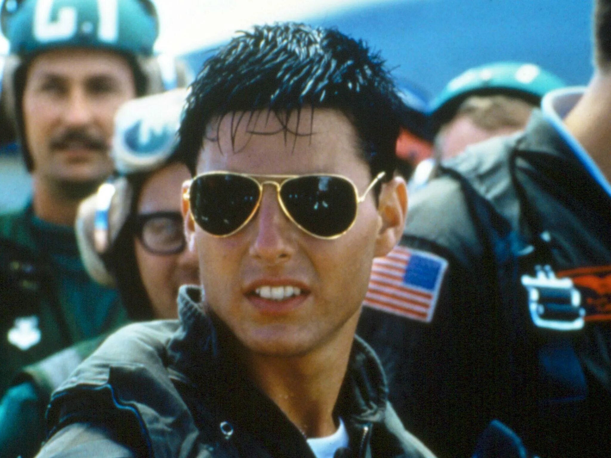 Лучший стрелок два. Том Круз топ Ган 1986. Top Gun том Круз. Топ Ган Мэверик том Круз в очках. Топ Ган Мэверик 1986.