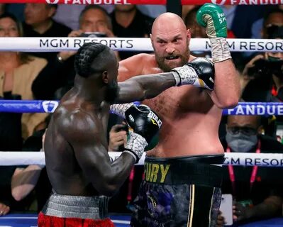 3. Tyson Fury predicted old rival Deontay Wilder would knock out 'bum&...