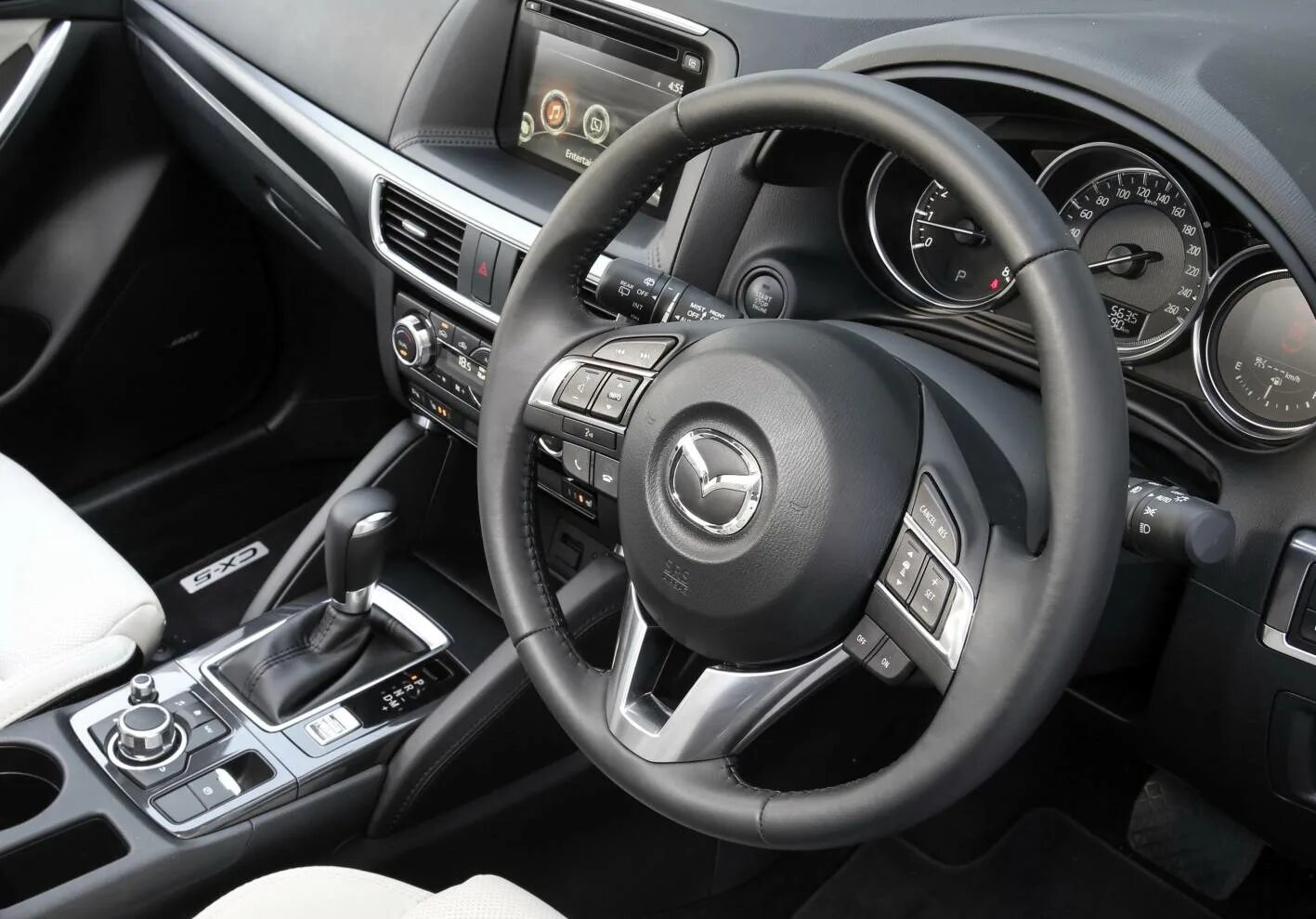 Управление сх 5. Руль Mazda CX 5 2015. Mazda cx5 Interior. Мазда cx5 2016 салон. Mazda CX 5 2016 салон.
