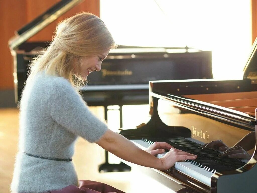 Look she playing the piano
