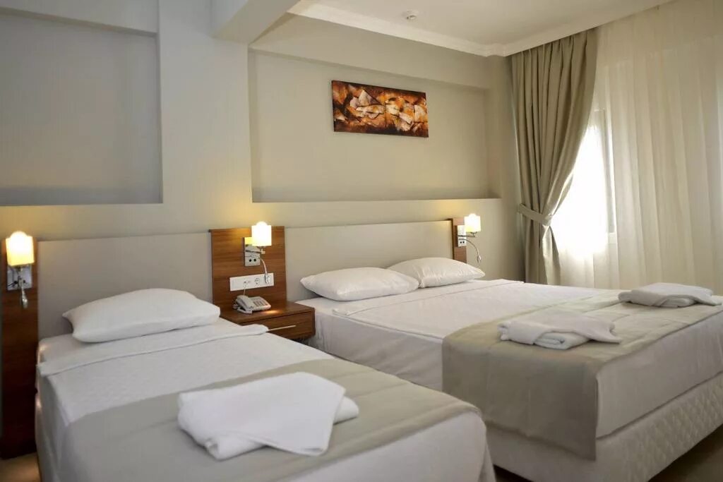 Bodrum hotel rooms. Anadolu hotel bodrum 4* гюмб. Anadolu hotel. Anadolu hotel bodrum 4* гюмб. Миляс бодрум отель.