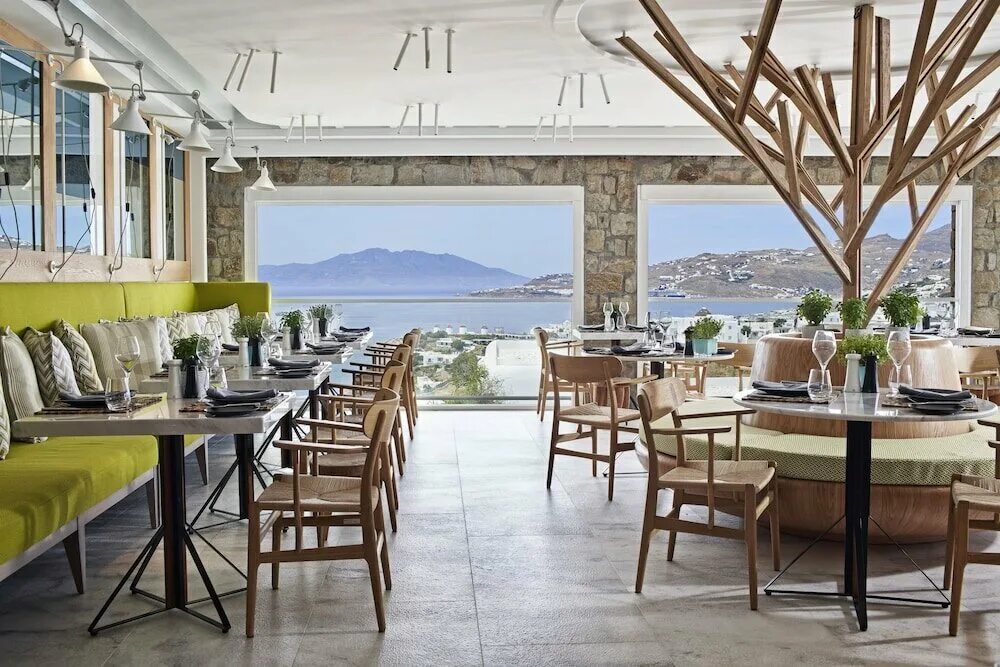 Daios cove crete. Ресторан в греции. Отель grande bretagne афины. Charizma ресторан санторини. Афины руфтоп бар.