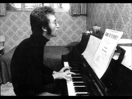 John playing the piano