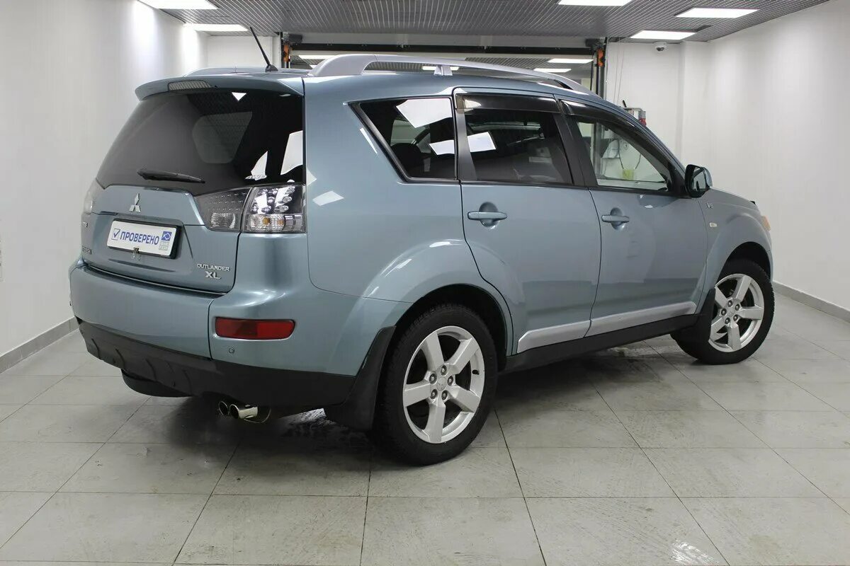 Mitsubishi outlander 2007 года. Митсубиси Аутлендер 2007. Митсубиси Аутлендер 2007г. Аутлендер 2 2007.