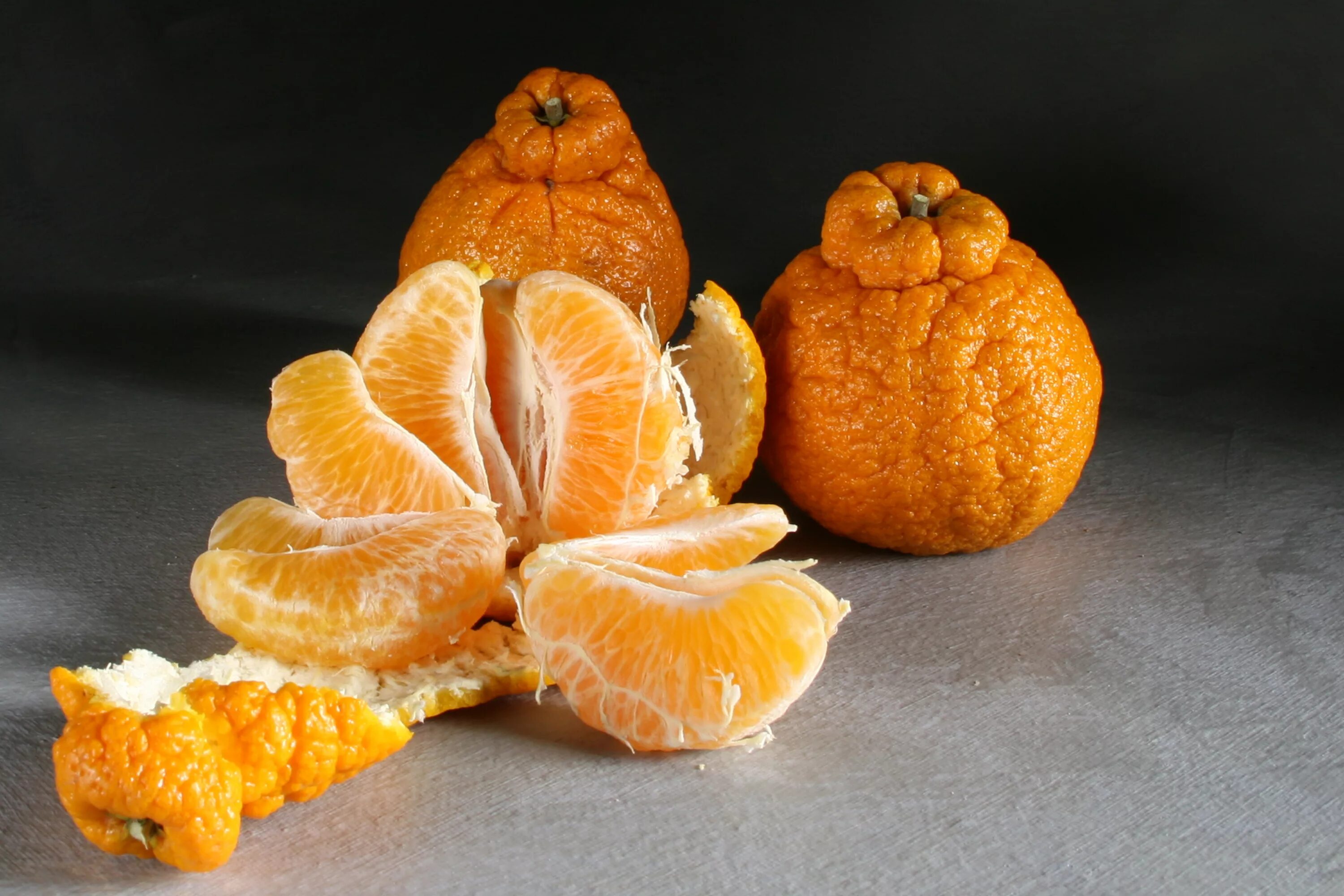 Сорта мандаринов минеола. Рангпур (фрукт). Мандаринкват индио. Гибрид мандарина и апельсина минеола. Фрукт похожий на апельсин.