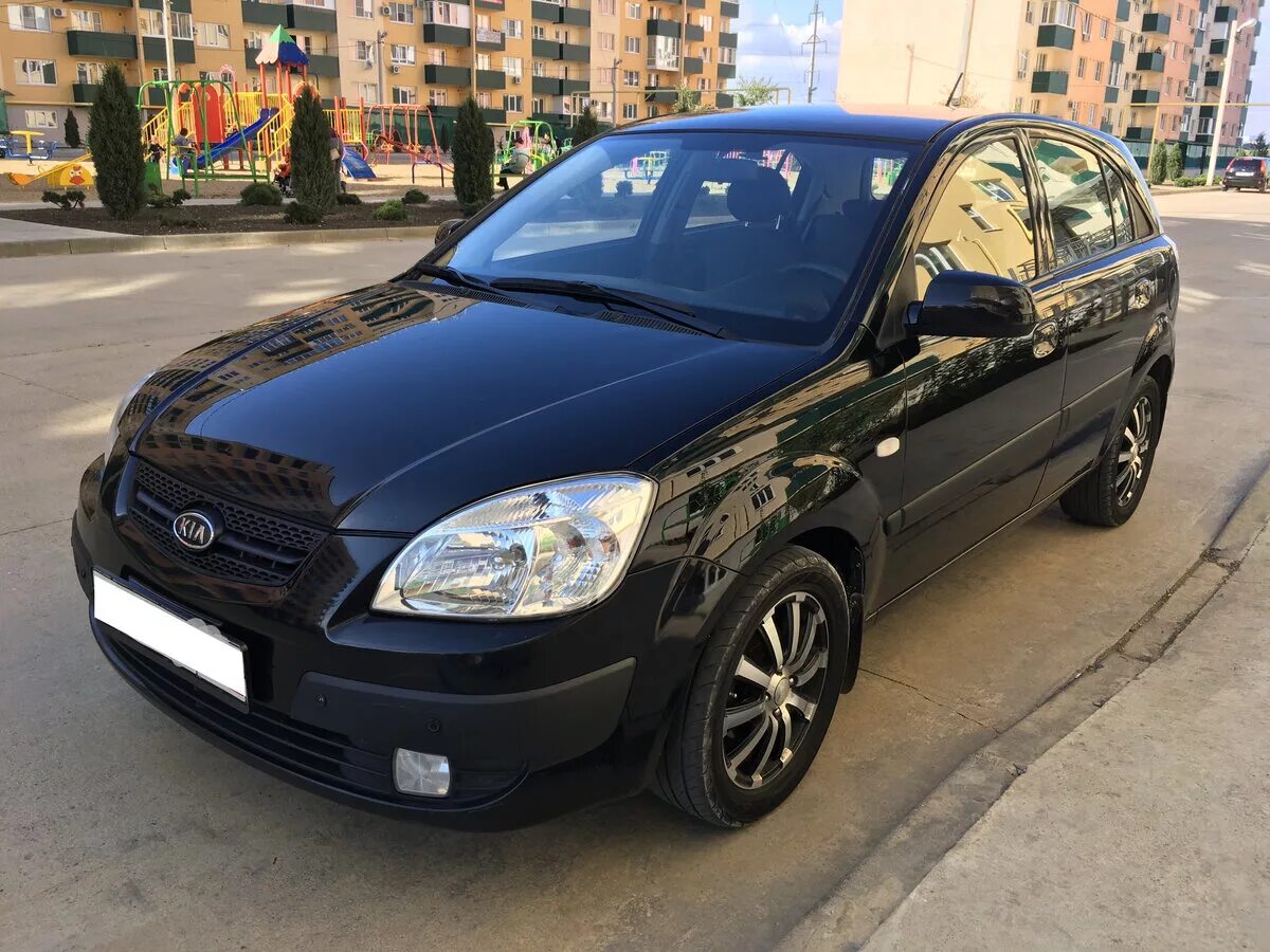 Kia Rio 2009. Kia Rio 2 2009. Киа Рио 2009 хэтчбек черный. Kia Rio 2009 1.4.