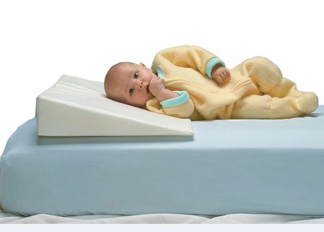 Подушка новорожденному с какого возраста. Подушка Plantex rest easy. Подушка позиционер Supreme Sleep Plantex. Позиционер для новорожденных для сна ортопедическая. Подушка позиционер для новорожденных Doomoo Basics.