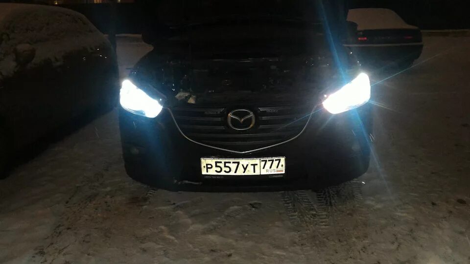 Замена лампочки мазда сх 5. Mazda cx 7 лампочки. Лампа туманки круз. Замена лампочки мазда сх 5. Лампы дхо мазда сх5.