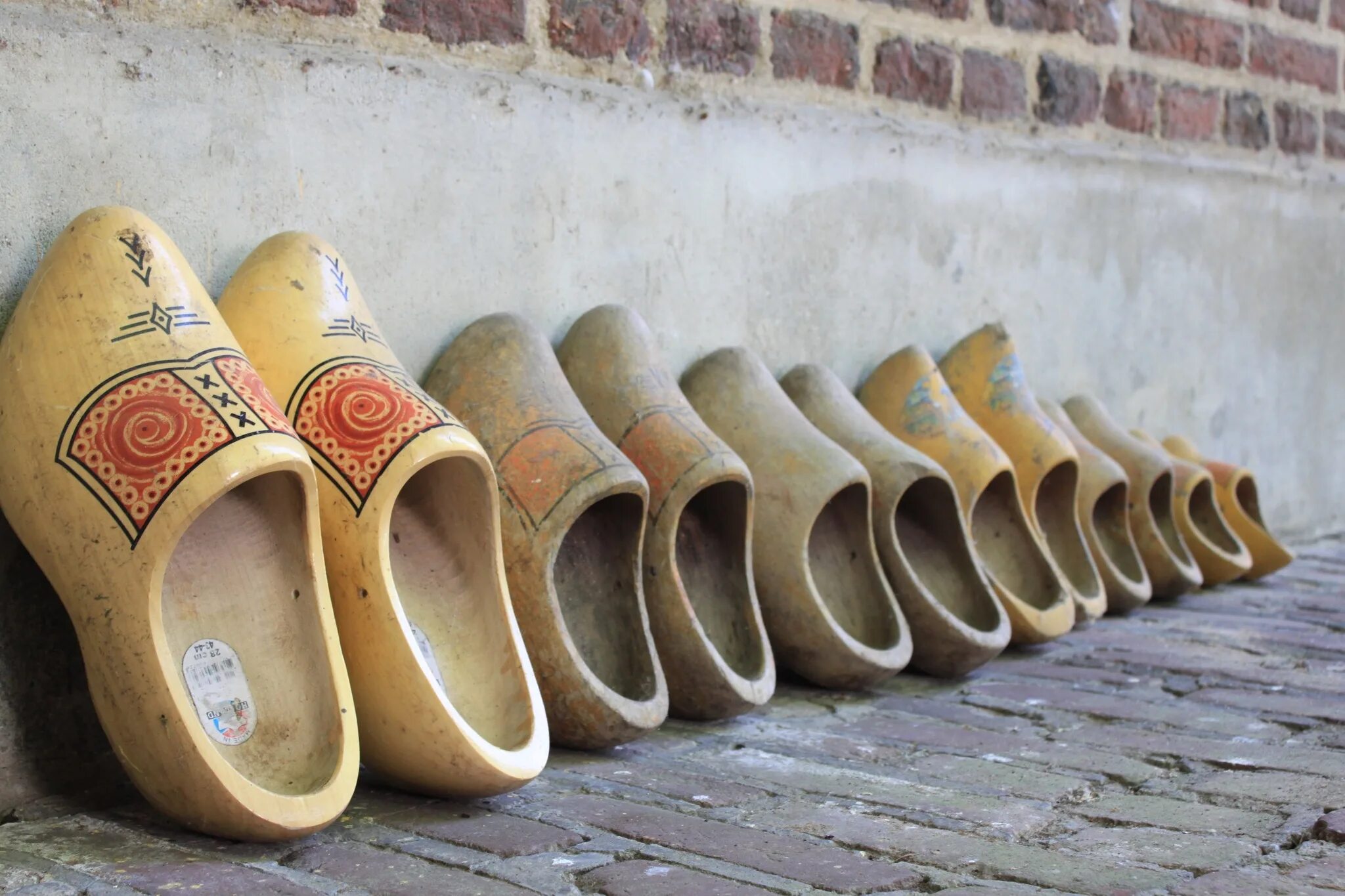 Traditional Dutch Farmers with Unique Footwear Discoveries