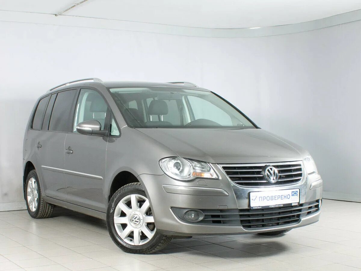 Touran 2010. Wv touran 2010. фольксваген туран коричневый. Vw touran 2. Volkswagen touran 2010 года.