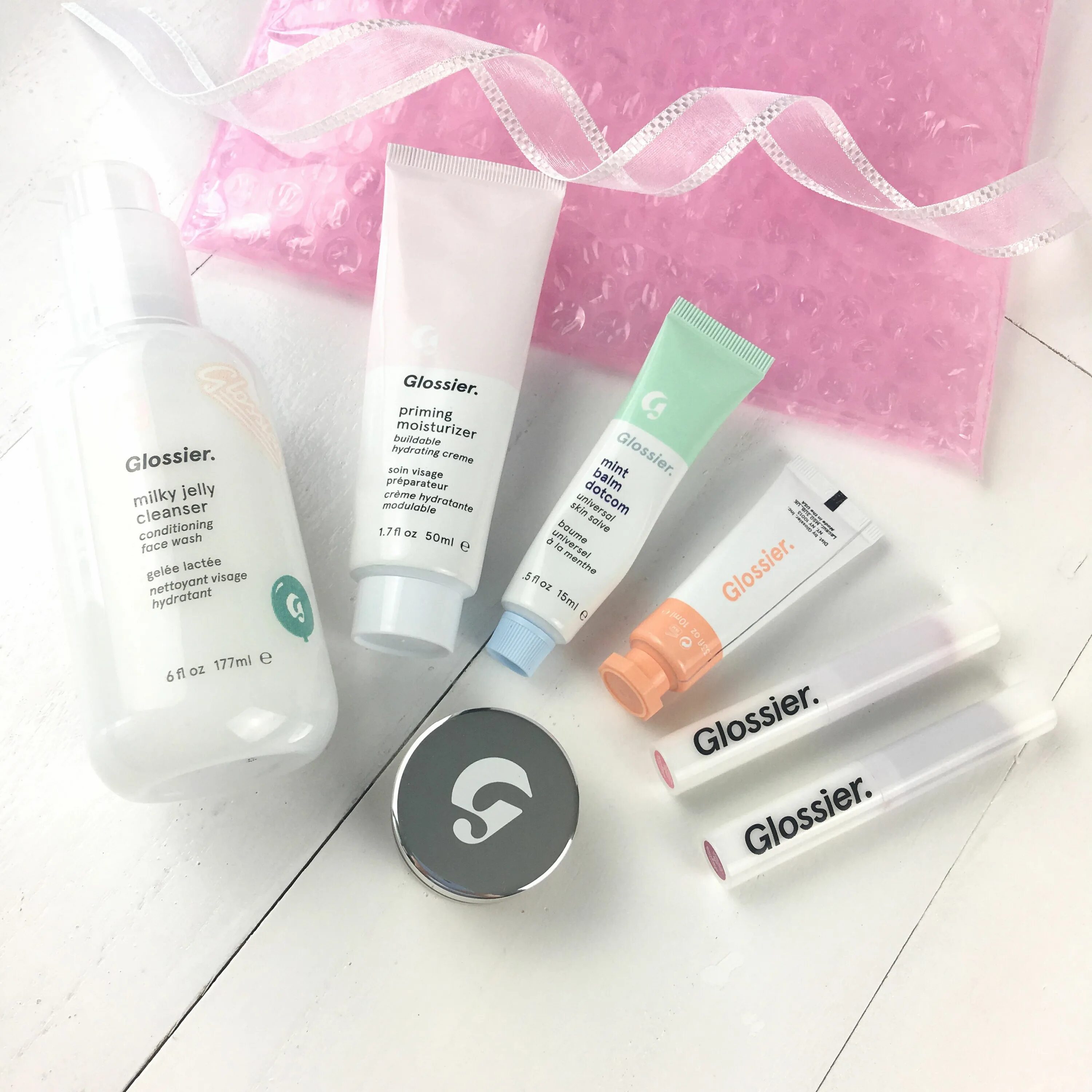 Milk makeup jelly. Glossier. Gloss косметика. Glossier чья косметика. Корректор облачко.