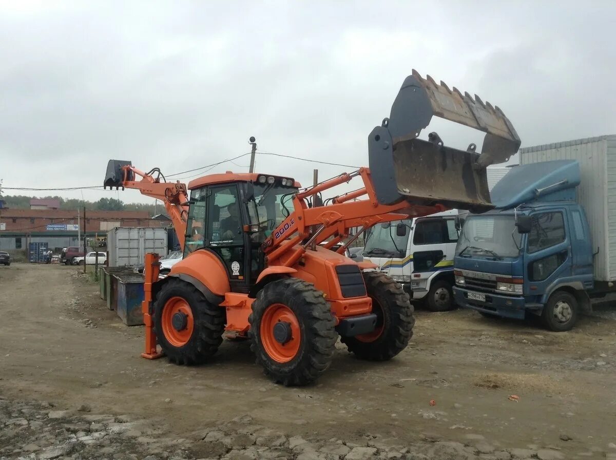 Экскаватор погрузчик Fiat Kobelco. Экскаватор Fiat Kobelco колесный. Погрузчик Фиат Кобелко w110a. Фиат Кобелко ф 110-2.