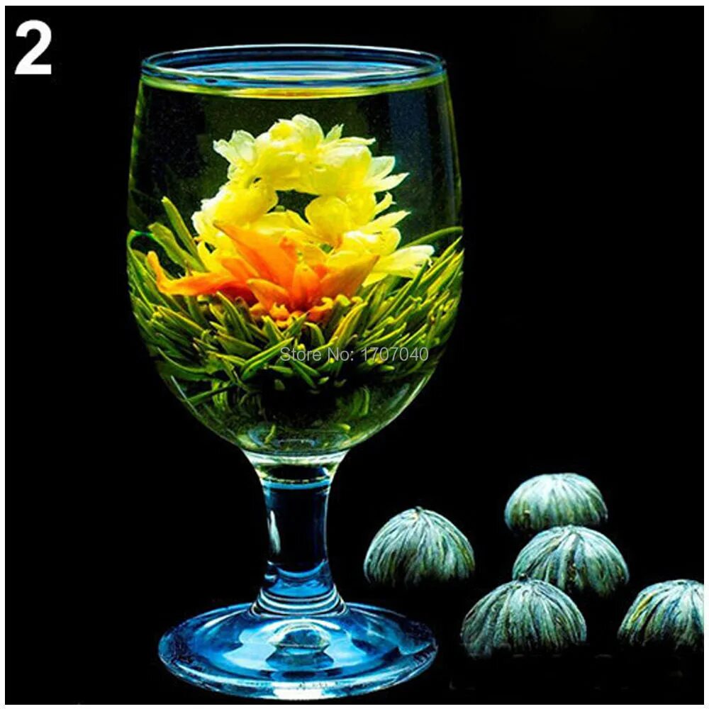 китайский чай шары дракона. зеленый чай цветок распускается. китайский чай цветок распускается. Blossom tea чай. связанный чай юй лун тао (нефритовый персик дракона).