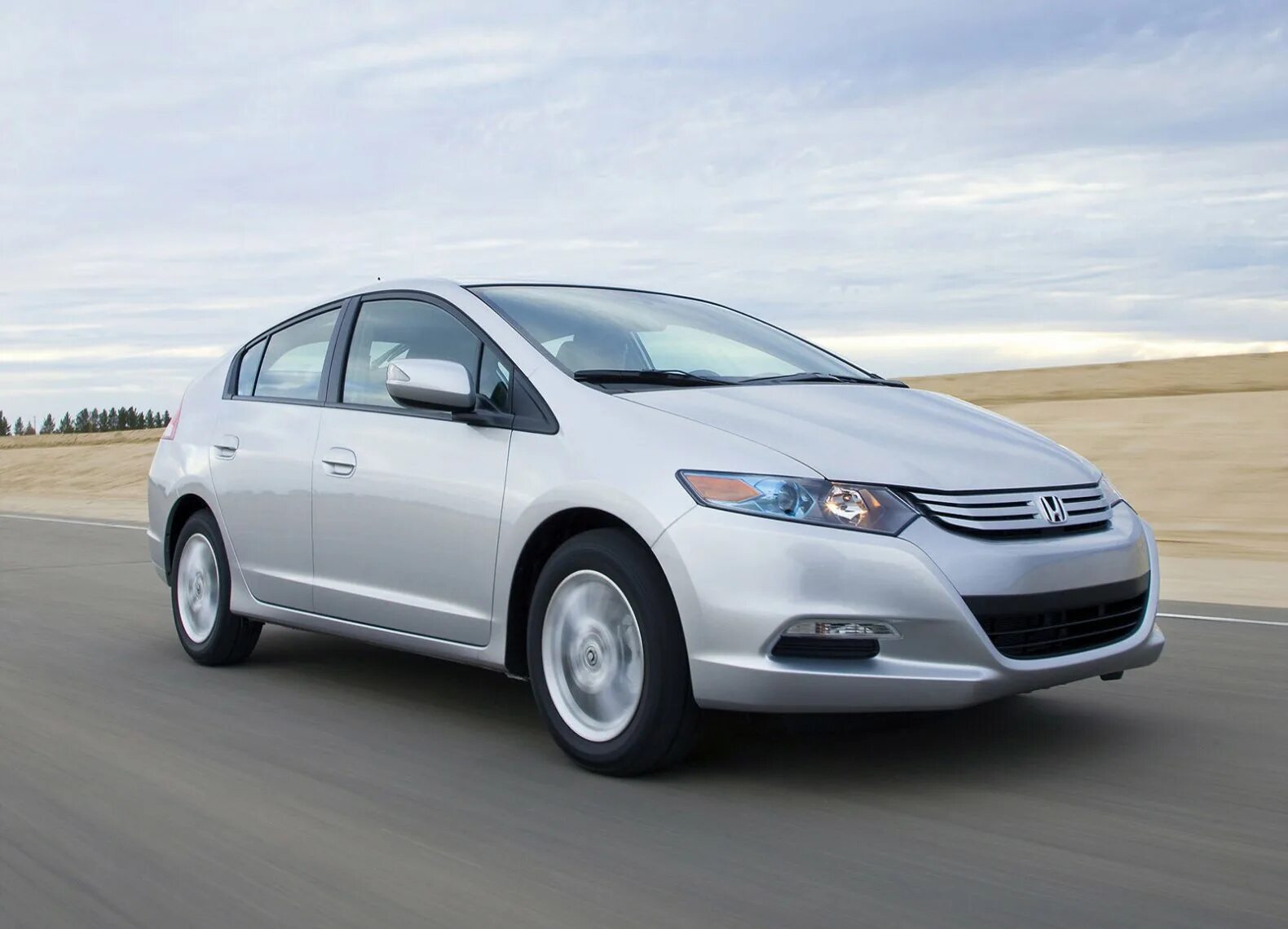 Инсайт телефон. Honda Insight II 2010. Honda Insight 2010. Honda Insight 2009. Honda Insight Hybrid 2010.