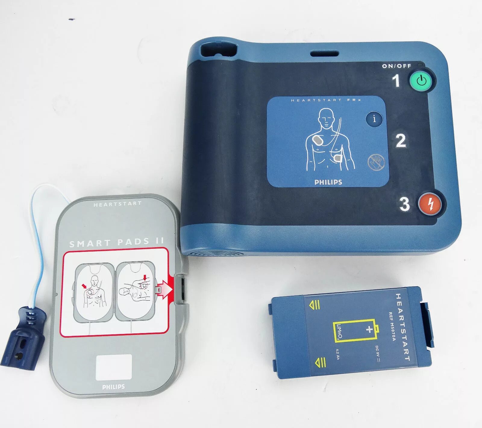 Дефибриллятор heartstart. Дефибриллятор philips heartstart frx. дефибриллятор heartstart frx. автоматический наружный дефибриллятор heartstart frx philips. дефибриллятор heartstart frx с принадлежностями.
