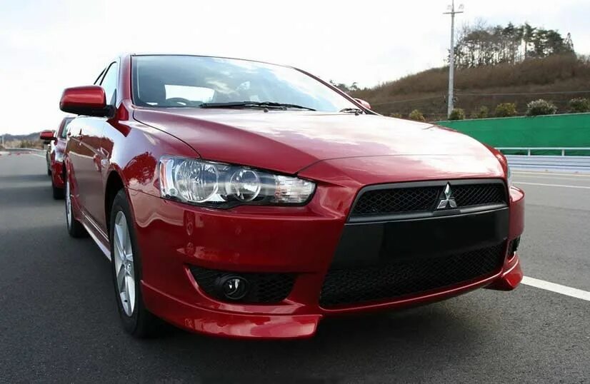 Lancer 10 2007. Митсубиси Лансер 10. Митсубиси Лансер 10 2007. Mitsubishi Lancer 10 кузов. Митсубиси Лансер 10 2006.