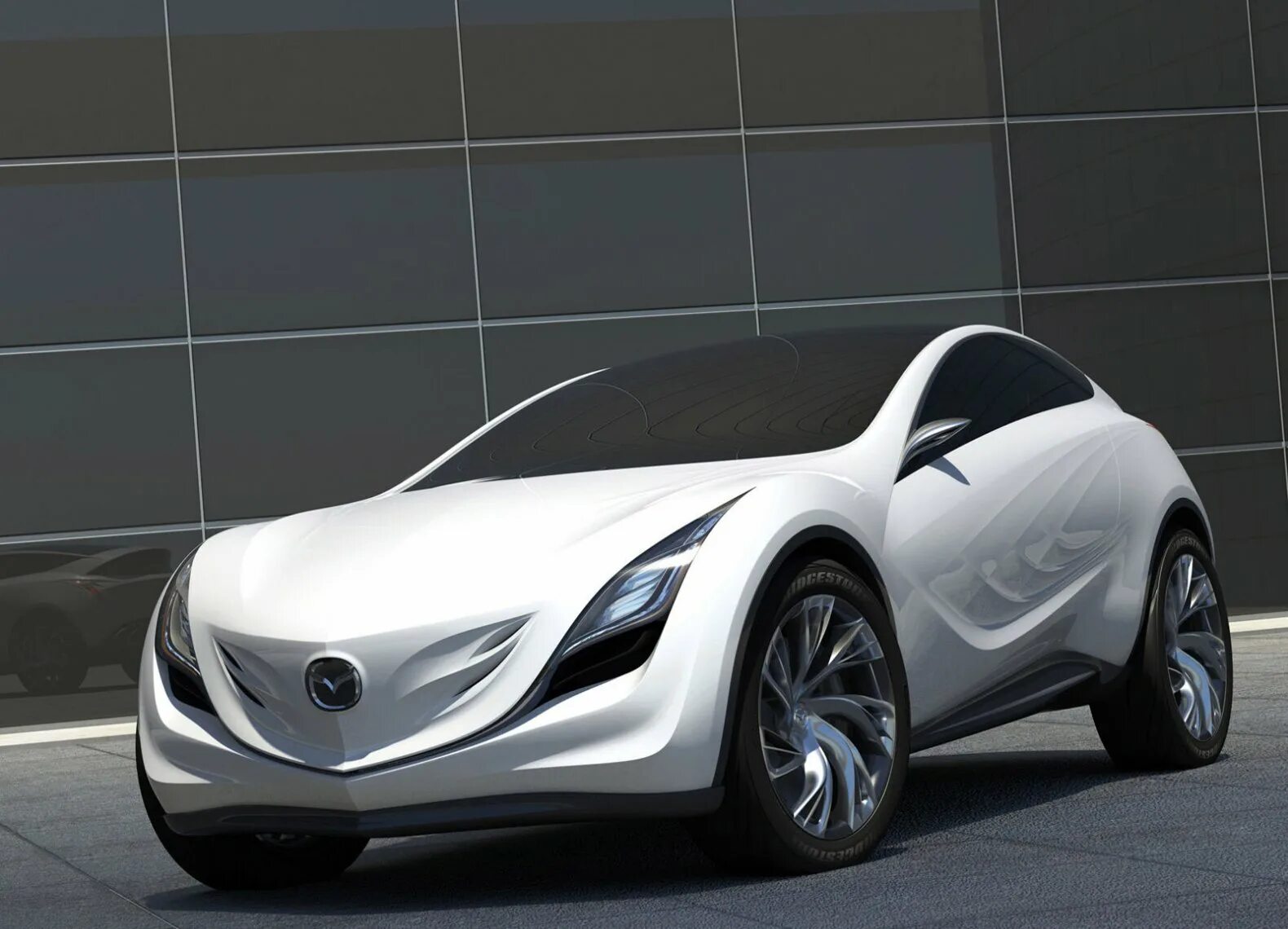 Mazda 11. Мазда Казамай. Mazda Concept 2000. Mazda 3 концепт. Новая Мазда 3 концепт.