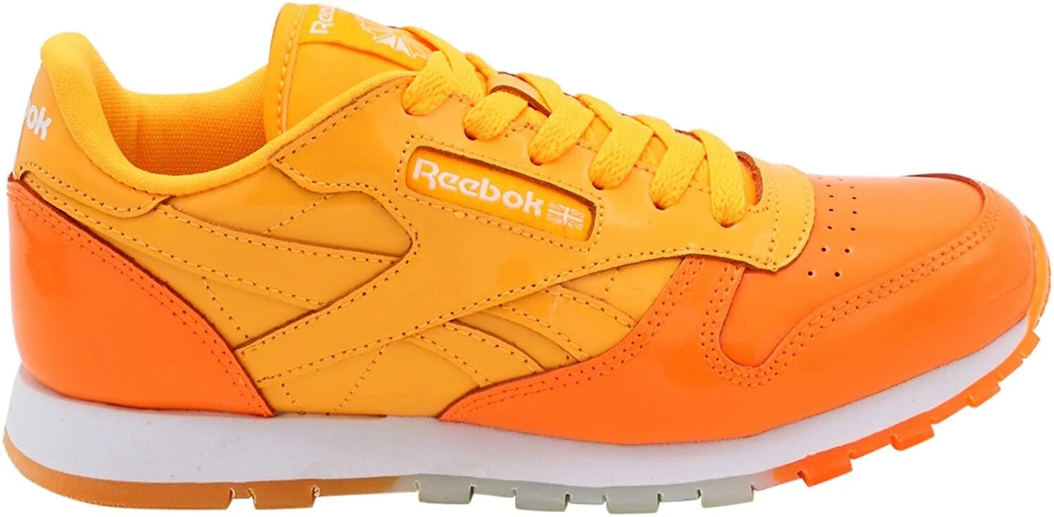 Кроссовки с оранжевой подошвой. Reebok Legacy оранжевые. Reebok Classic Leather Orange. Reebok Classic оранжевые. Кроссовки рибок оранжевые.