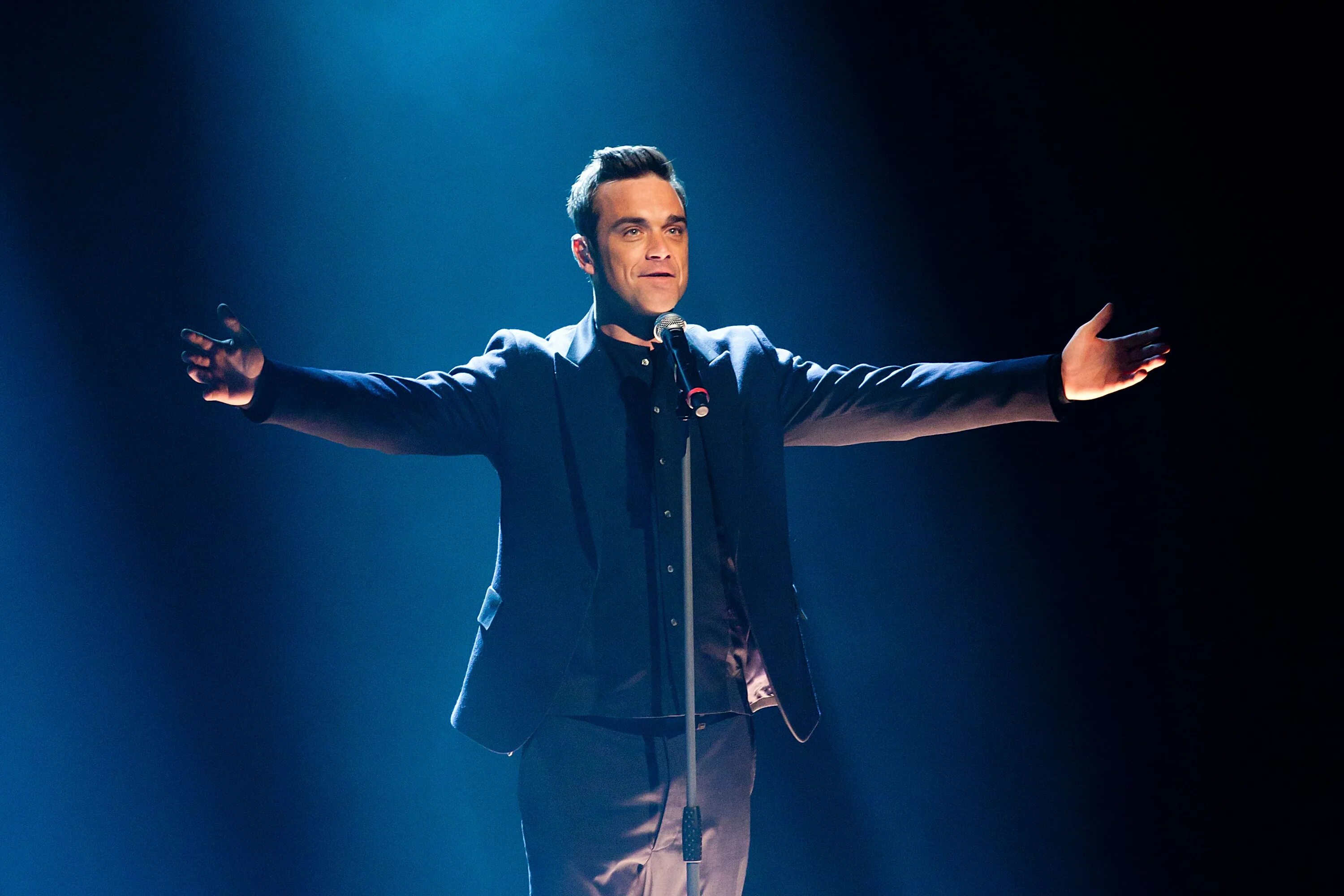 Робби уильямс тексты. Робби уильямс. robbie williams певец. английский певец робби уильямс.
